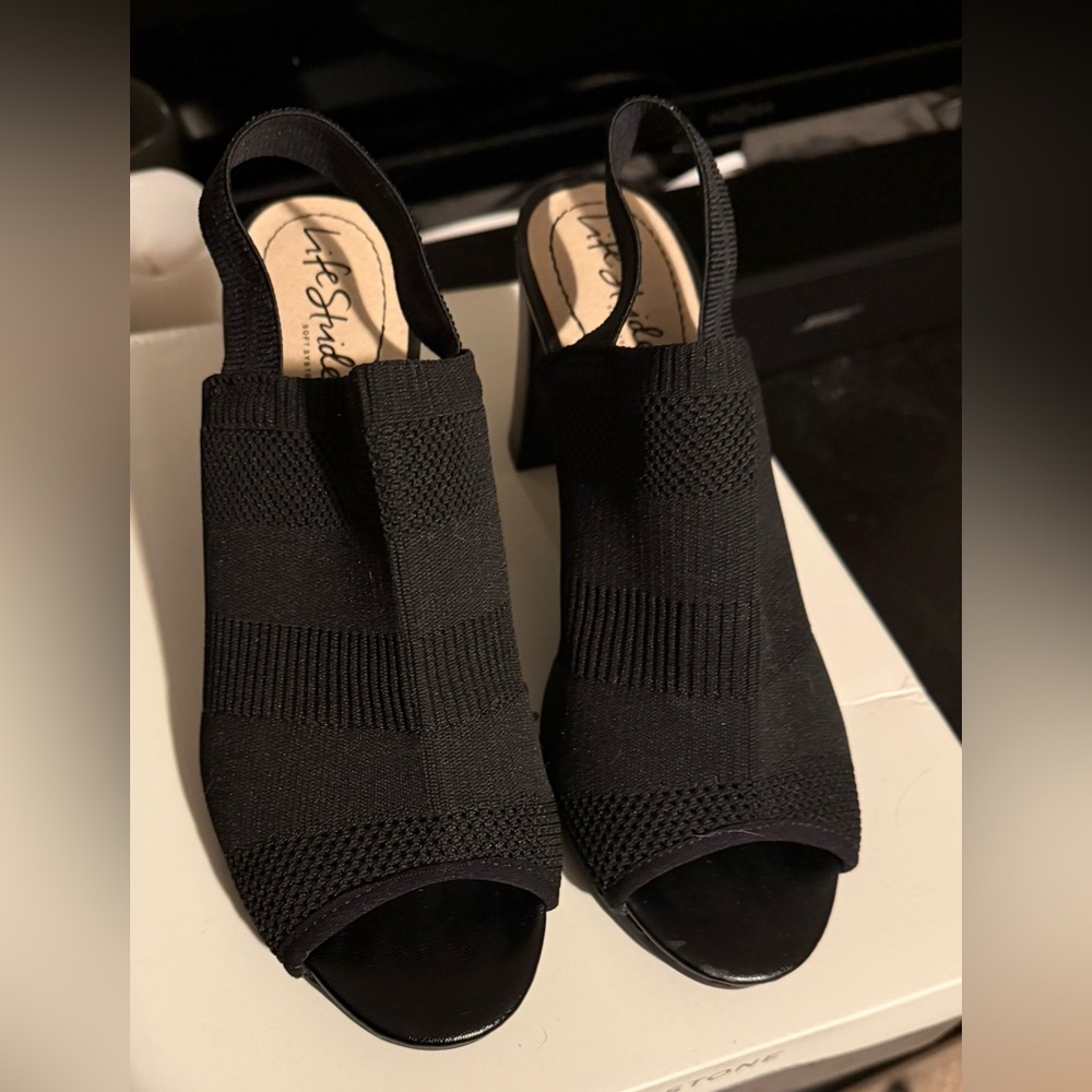 Black heeled open-toed sandals